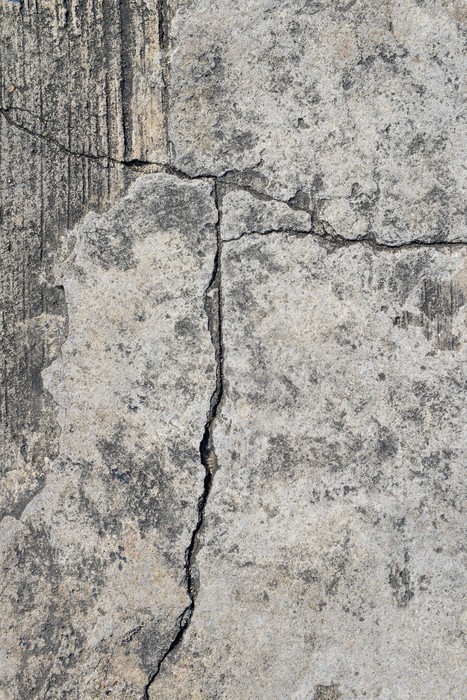 Fototapeta Zbliżenie tekstury betonu pęknięty tle.
