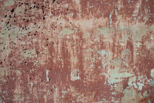 Fototapeta Szorstki teksturowanej tle stary czerwony mur plamy z cementu, suche