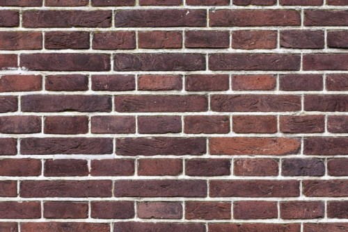 Fototapeta Ciemny brąz ściana cegła wzór obrazu.
