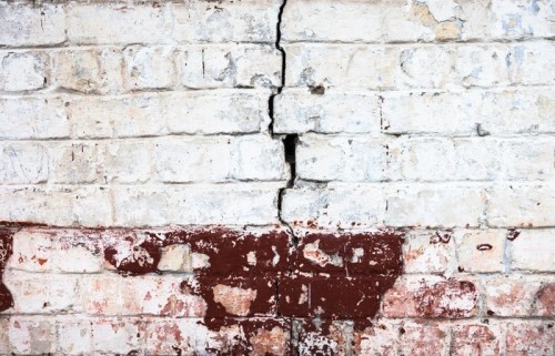 Fototapeta Pęknięty mur bielony